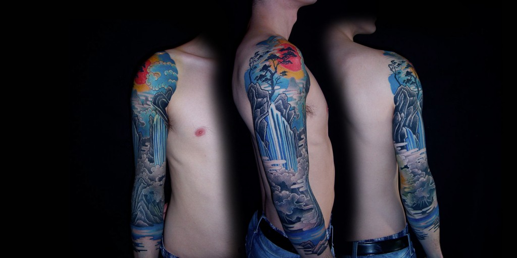 Custom full sleeve tattoo done in Chiang Mai waterfall design