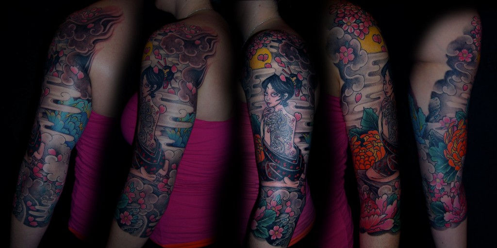 Japanese quarter sleeve with floral designs done in Chiang Mai