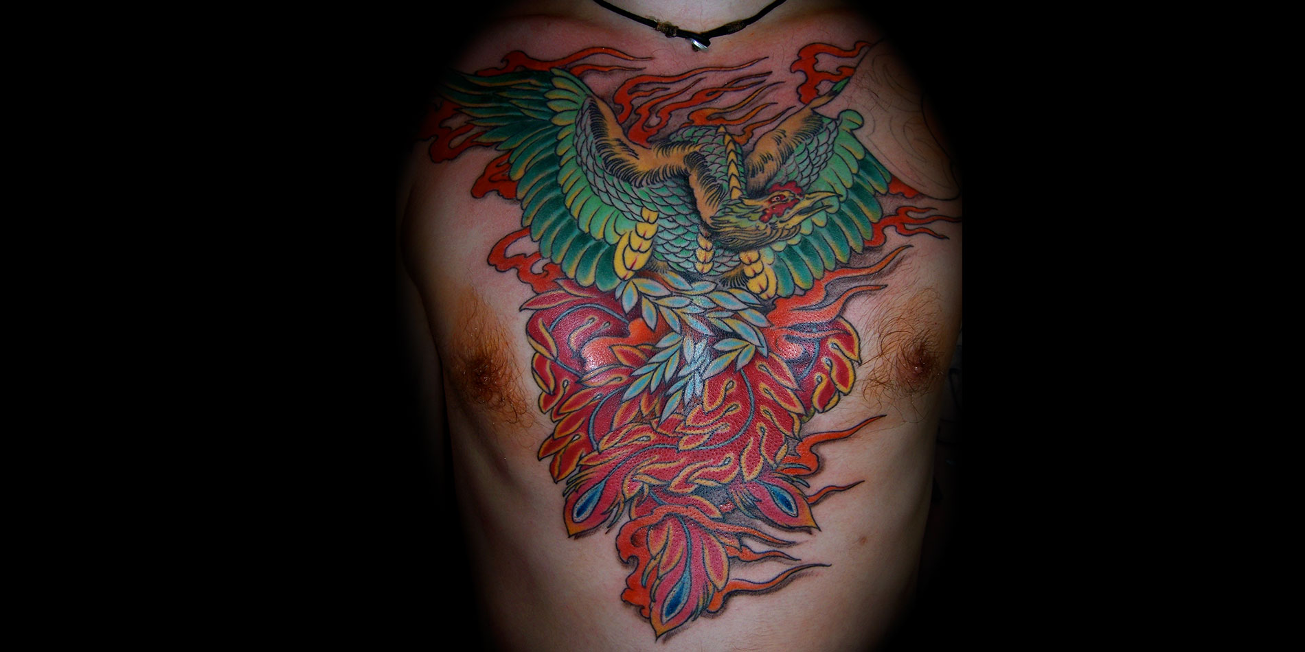 full chest pheonix tattoo custom design by modzilla tattoo studio in chiang mai thailand
